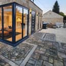 Original roof tiles from the property were re-purposed to form a unique patio area.