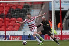 Caolan Lavery gets on the ball for Doncaster Rovers against Hartlepool United. Photo: Mark Fletcher | MI News.
