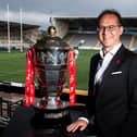 Jon Dutton poses with the men's World Cup trophy. Picture: SWPix.com