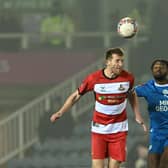 Doncaster Rovers have won 21 points at the 60 minute mark this season.