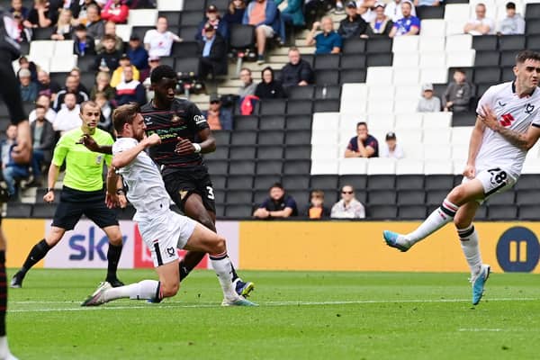 Mo Faal has a shot at goal for Doncaster Rovers.