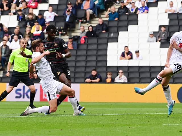 Mo Faal has a shot at goal for Doncaster Rovers.