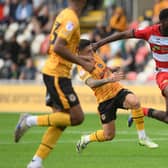 New Doncaster Rovers signing Mo Faal in action against Newport County.