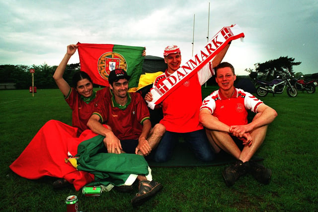 Silvia Farto and Jose Santos of Portugal with Thomas Diechmann and Henrik Laurtzen from Denmark camping on the Sheffield Tigers Rugby Union pitch at Dore, Sheffield, for Euro 96.