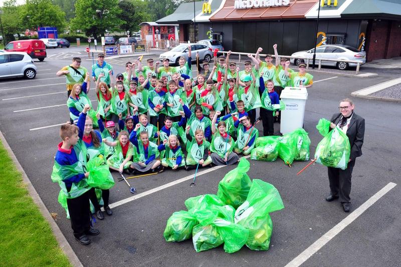 Stranton Primary Schools pupils Sam Allen and Ellie Whitehead, front, are picture with Denise Noble from McDonalds and fellow litter pickers after a grand clean-up in 2014.
