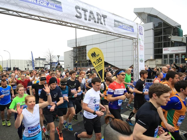 Half marathon runners on Arundel Gate in Sheffield. Picture: Chris Etchells.