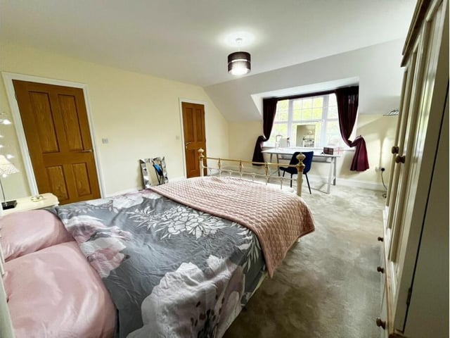 A spacious double bedroom.