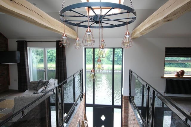 Contemporary design with views of the canal on the property's first floor.