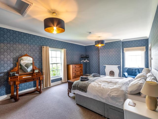 Seven impressive bedrooms in the property are served by five bathrooms.
