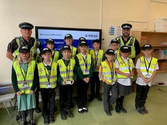 Pupils from Hilltop School Edlington don their uniforms to become mini-police officers.
