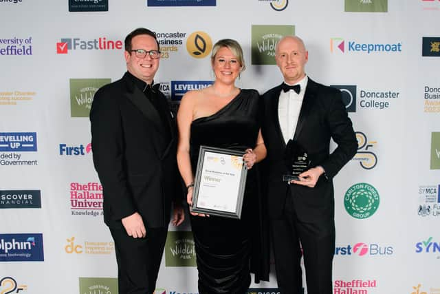 Harrison College principal Gemma Peebles and chief commercial officer Mike Peebles (right) receive the small business of the year award.