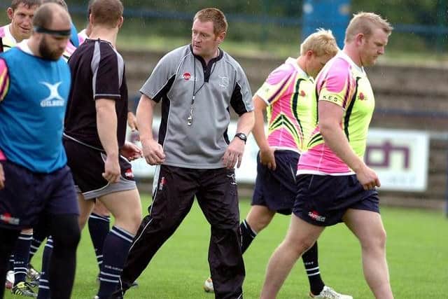Brett Davey, third right, was Doncaster Knights' coach when Steve Boden was released.