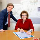 Pictured is, from the left, Toby Lewis, RDaSH Chief Executive, and Kathryn Lavery, RDaSH Chair, signing the Smokefree pledge