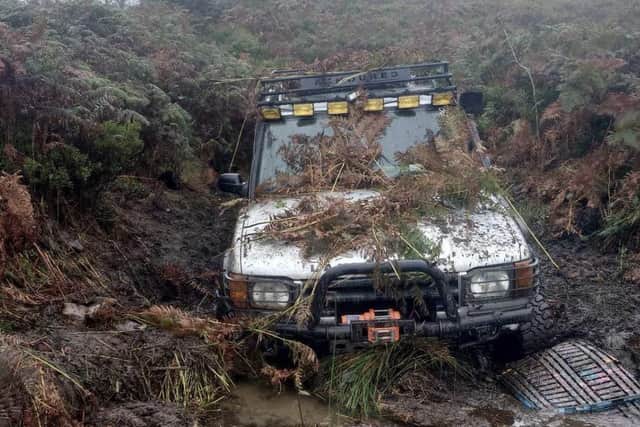 The Land Rover had to be dragged from a muddy swamp.