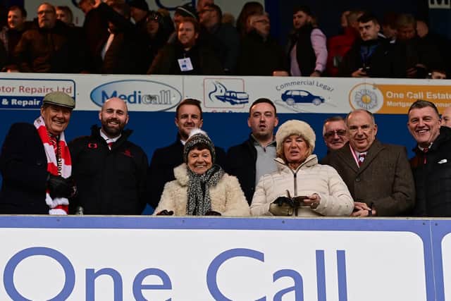Doncaster's owners watched Saturday's 4-1 defeat to Mansfield Town.