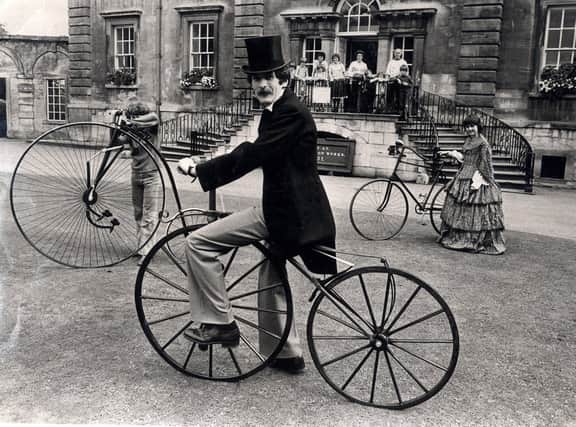 Cusworth Hall Museum acquired these cycles in 1978 and  Curator Graham Nicholson is seen on an 1865 boneshaker, and left is an 1875 Penny Farthing and right an 1880 safety cycle..September 14, 1978