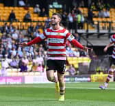 Luke Molyneux celebrates a goal at Port Vale.