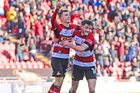Zain Westbrooke celebrates his first Doncaster Rovers goal with Tom Nixon.