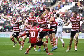 Rovers celebrate Tom Anderson's equaliser. Picture: Howard Roe/AHPIX LTD