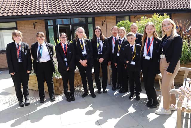 Students from Sir Thomas Wharton school are pictured with Miss Gerard at St John’s Hospice.