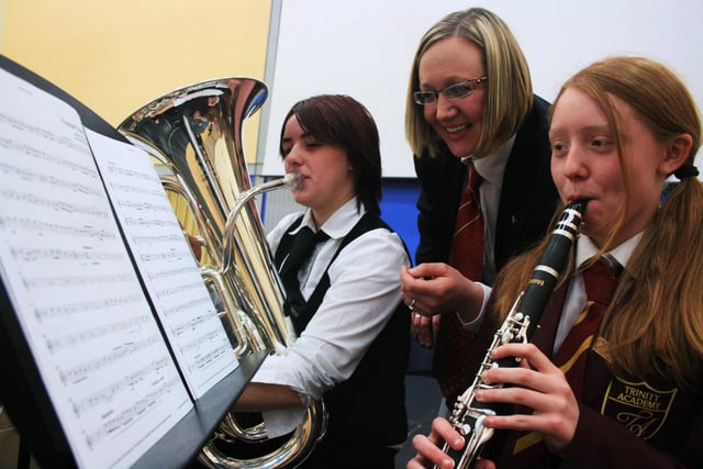 Joanna Mather, of Balby Carr College, Laura Boyle of the Reg Vardy Band and Rebecca Scorer, of Trinity Academy, enjoy the musical workshop.