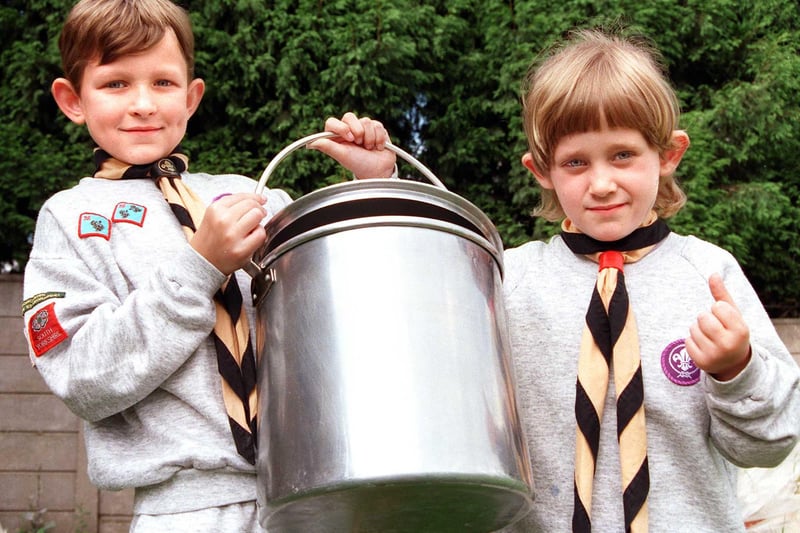 Thanks to the fund-raising efforts of Scouts, Venture Scouts, Cubs and Beavers the 32nd (Armthorpe) Doncaster Scout Group was able to buy some new outdoor cooking equipment. Our picture shows Beavers  Andrew Hodby, aged eight, and Joanne Pratt, aged six, with a dixie - that's a cooking pot to non-scouting types, June 1998