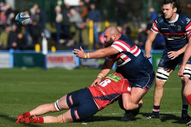 Destructive force: Doncaster Knights' Joe Jones, right, releases the ball after being tackled by London Scottish's Tom Marshall earlier this season. (Picture: Jonathan Gawthorpe)
