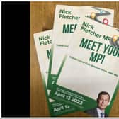 Nick Fletcher says the green design of the leaflets, which do not mention he is Conservative, was "deliberate"