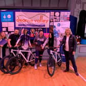 Cathy Kemp,  Practice Manager of Coriel Orthopaedic pictured with young people  Dearne Valley Personal Development Centre(DVPDC) and the bikes donated by Coriel Orthopedic.