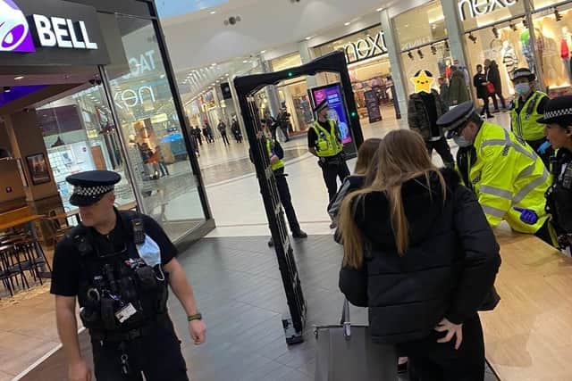 Police searching people in the Frenchgate.