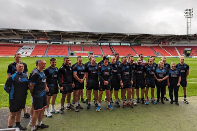 Staff at Doncaster Rovers have raised more than £15,000 for Prostate Cancer Research.