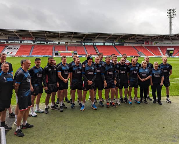 Staff at Doncaster Rovers have raised more than £15,000 for Prostate Cancer Research.