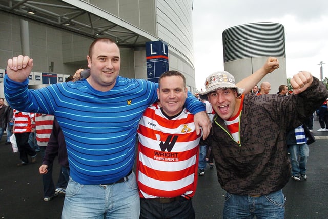 Rovers fans Matthew Thornhill, Steve Bailey and Craig Maye, all of Edlington, celebrate beating Leeds United at Wembley.