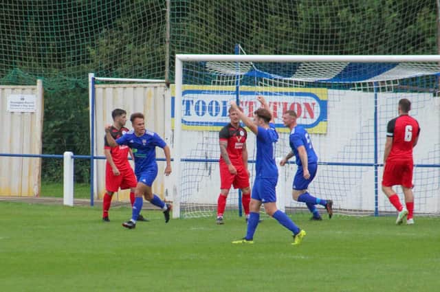 Jack Watson, left, scored the only goal of the game when Rossington Main beat Armthorpe Welfare earlier in the season. Photo: Steve Pennock
