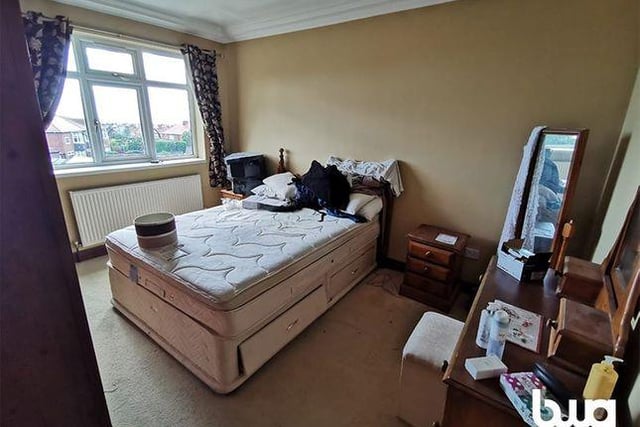 Added to the property as part of an extension, this large bedroom overlooks the back garden.