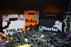 Halloween boxes come in orange, black and white.