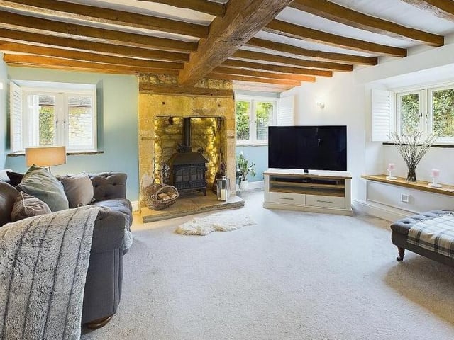 A stunning beamed sitting room.