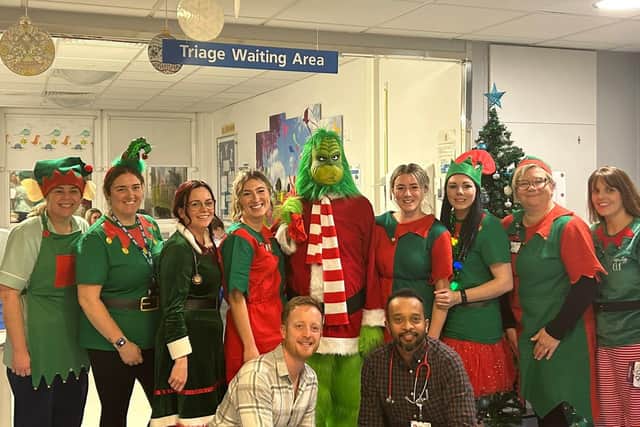 Staff on the children's ward with the grinch for the Winter Wonderland fundraising event.