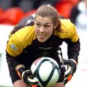Mary Earps collects a cross during a match against Liverpool at the Keepmoat Stadium, as it was then known.