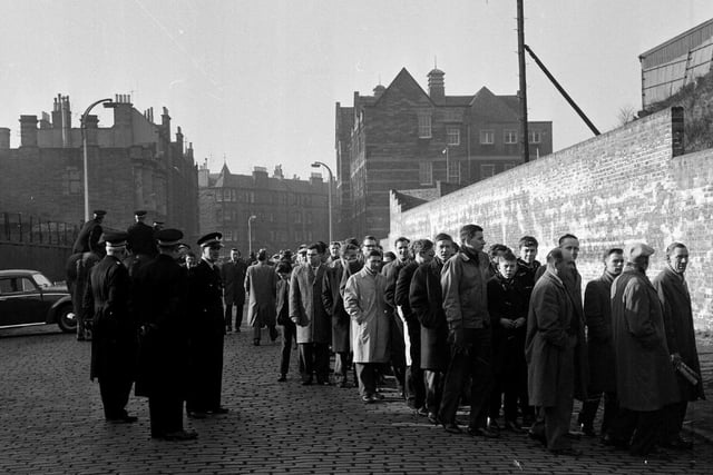 Supporters queue outside Easter Road in March 1963