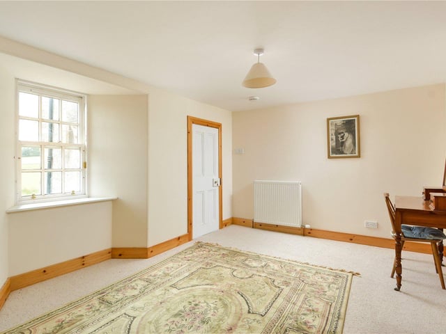 One of the three bedrooms.