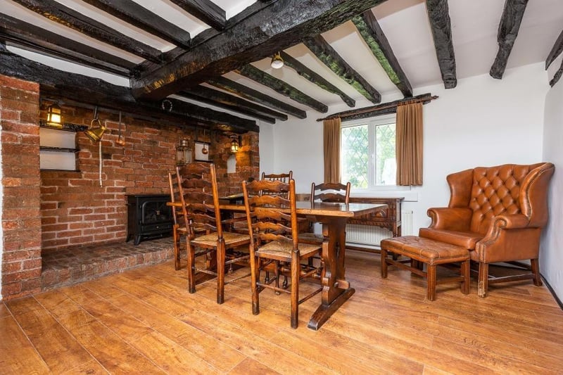 All three reception rooms in the house contain original ceiling beams.