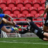 Luke Briscoe scores for the Dons in their friendly defeat to Hull FC. Picture: Howard Roe/AHPIX.com