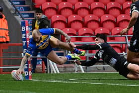 Luke Briscoe scores for the Dons in their friendly defeat to Hull FC. Picture: Howard Roe/AHPIX.com
