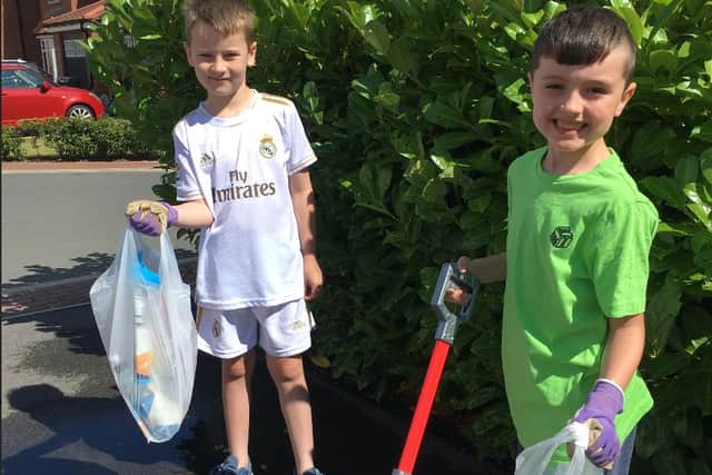 Pals Max Thompson, left,  and Drew Sitt, right, have been hitting the streets of Edenthorpe to clear litter