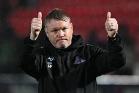 Rovers chief Grant McCann acknowledges the travelling supporters at Salford. Picture Howard Roe/AHPIX LTD.