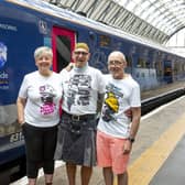 Jen Dewsnap from Doncaster Pride with Jonathan Blake and Mike Jackson at London King's Cross