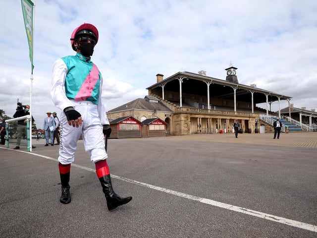 A masked Frankie Dettori at Doncaster in 2020 when the race was run behind closed doors because of the Covid pandemic. (Photo by David Davies - Pool/Getty Images)