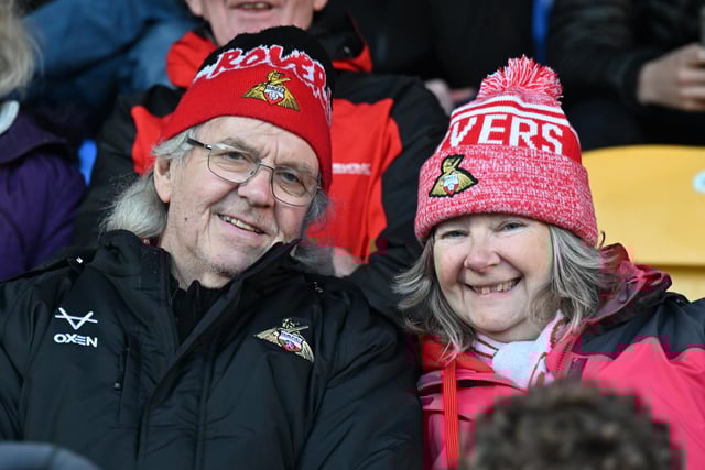Doncaster Rovers slipped out of the top three after losing at promotion rivals AFC Wimbledon.