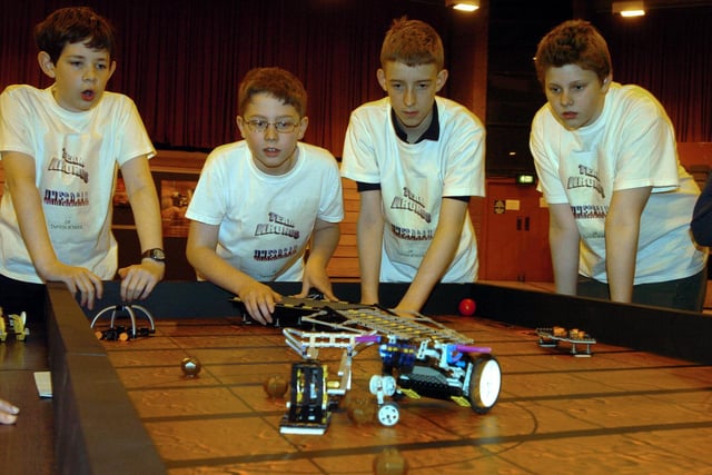 From left Andrew Leggett, 11; Ryan Taylor, 12; Adam Tankard, 12 and John-Paul Ashton 13  four members of the Tapton school team watching their robot Kronos in action during the first Lego League competition at the University of Sheffield's Octagon centre in 2004